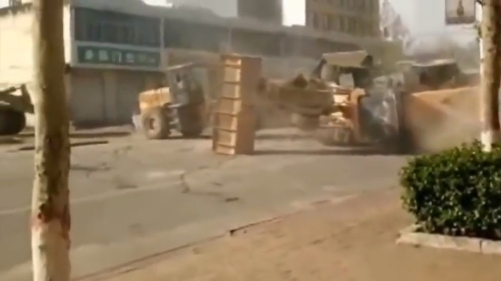 Çin'de buldozerler savaşı İZLE